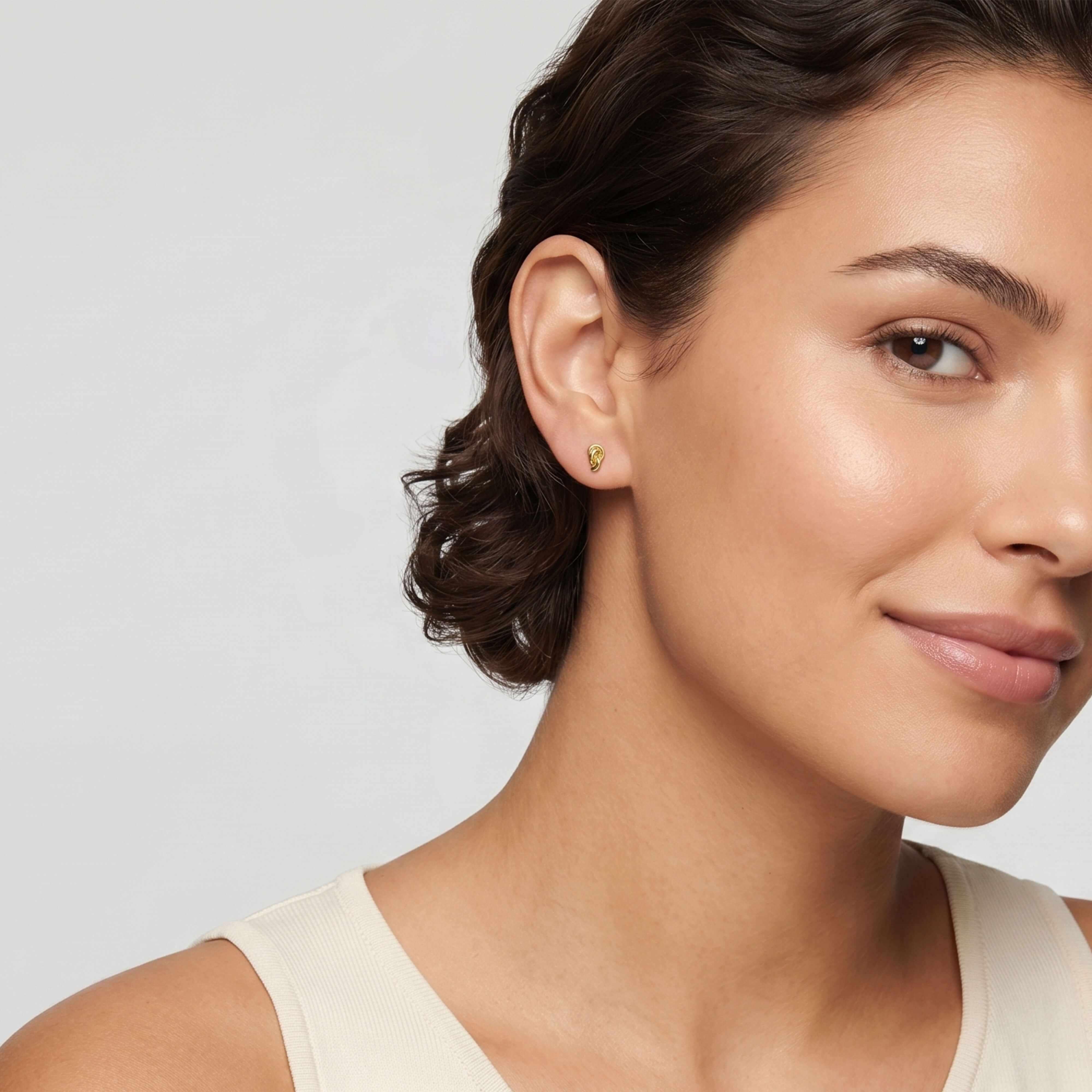 Knot stud gold earrings