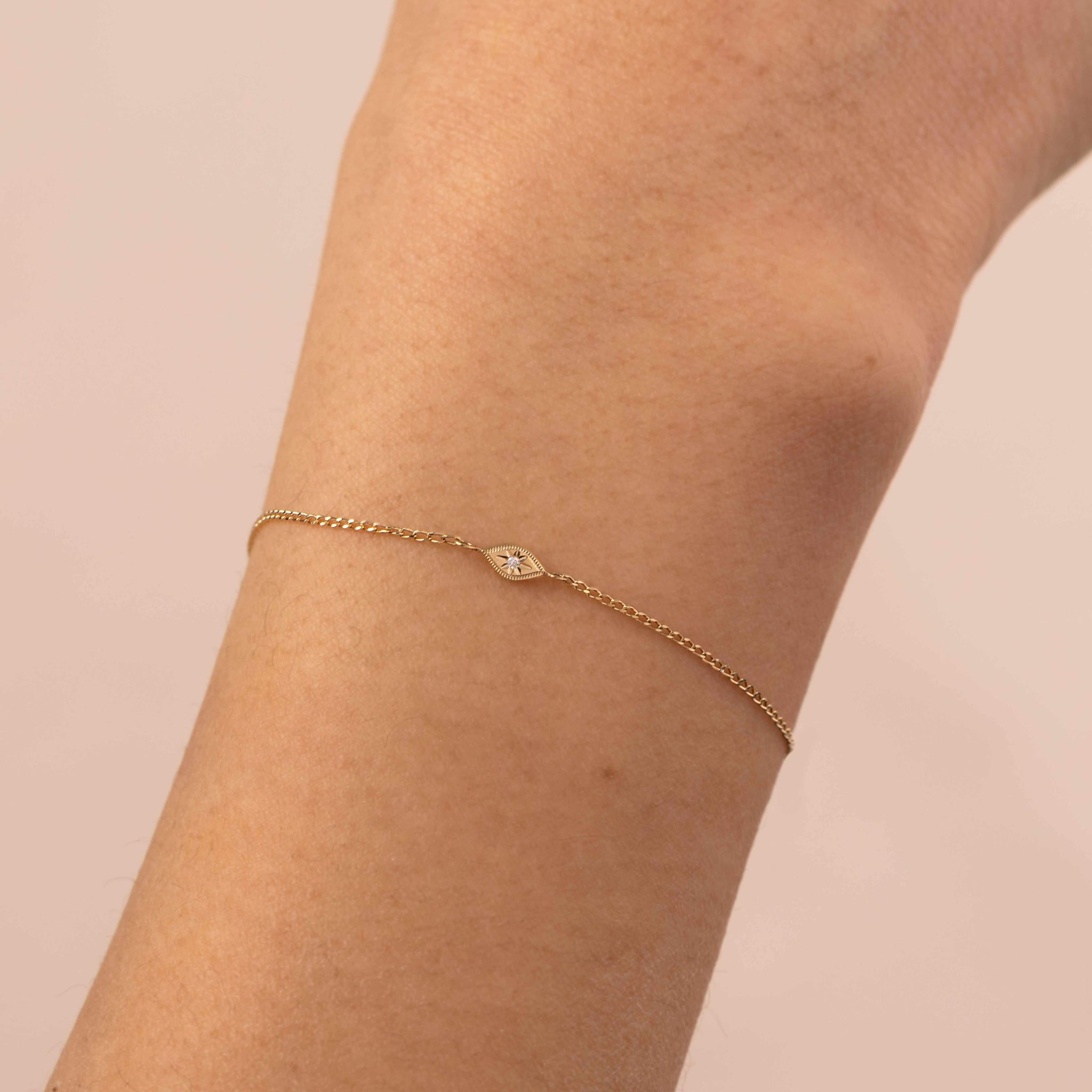 Permanent evil eye bracelet with lab diamond