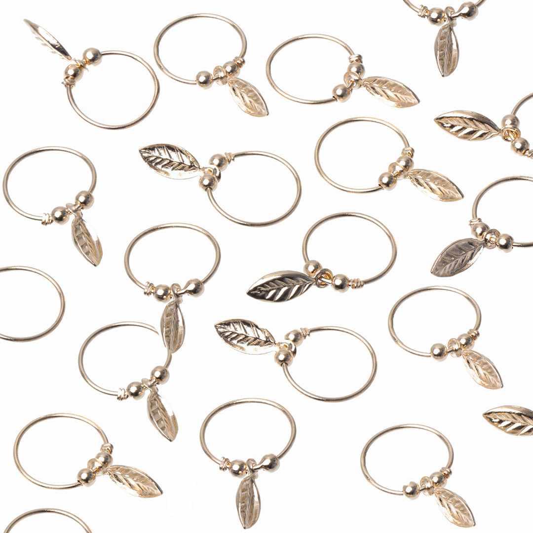 Cyrus leaf charm sleeper earring | MEZI