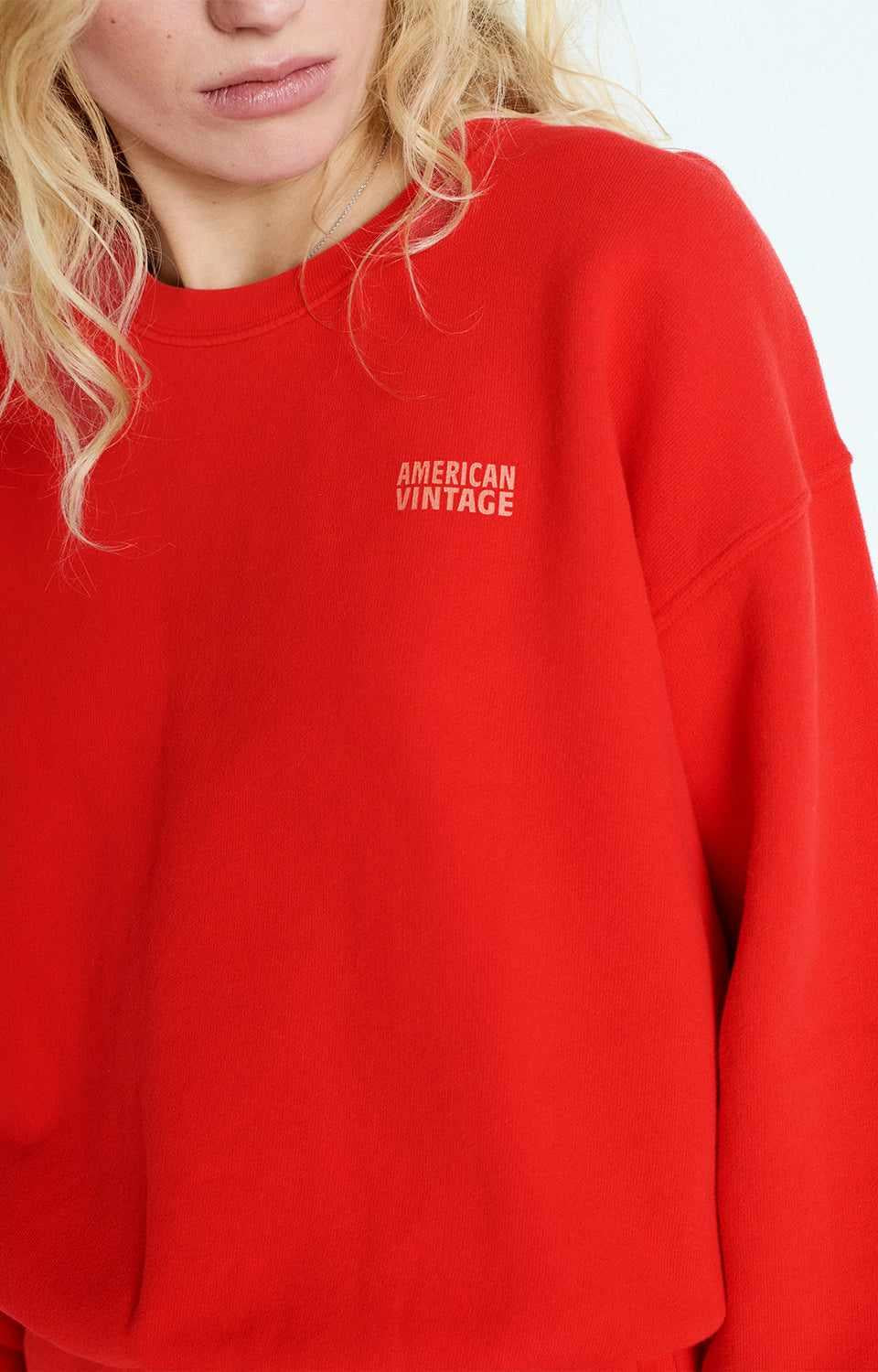 Close-up of soft cotton, bright red,  American Vintage Izubird sweatshirt G-IZU03A, sold at MEZI Australia.