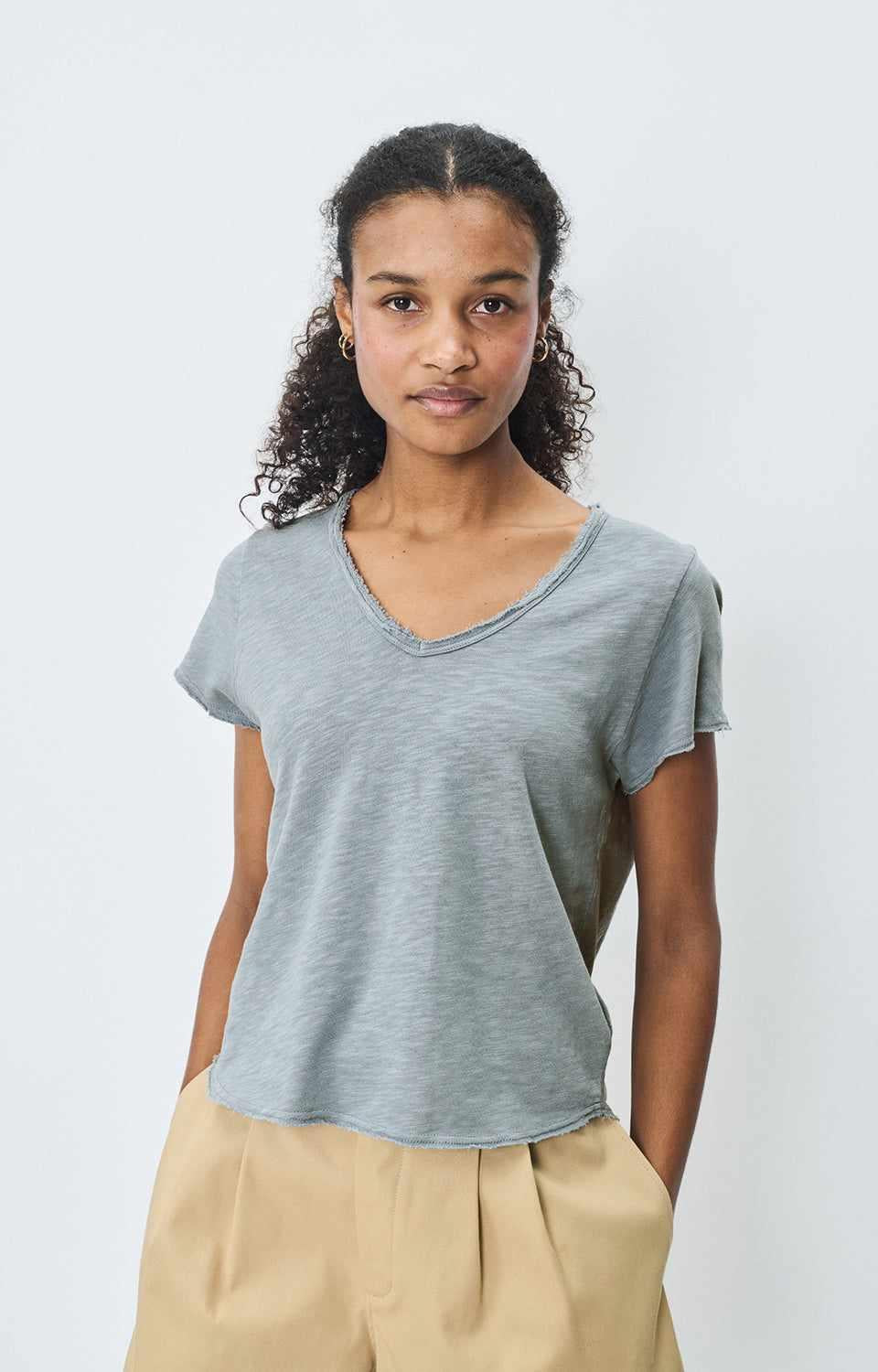 Model wearing American Vintage Sonoma V-Neck tee SON02AG, showing V-neckline and relaxed silhouette, sold at MEZI Australia.