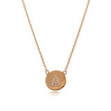 Initial gold disc necklace