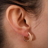 Karia rose gold huggie earrings