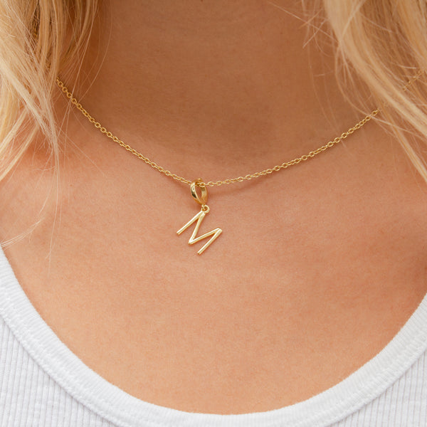 Initial medium charm gold hinge pendant