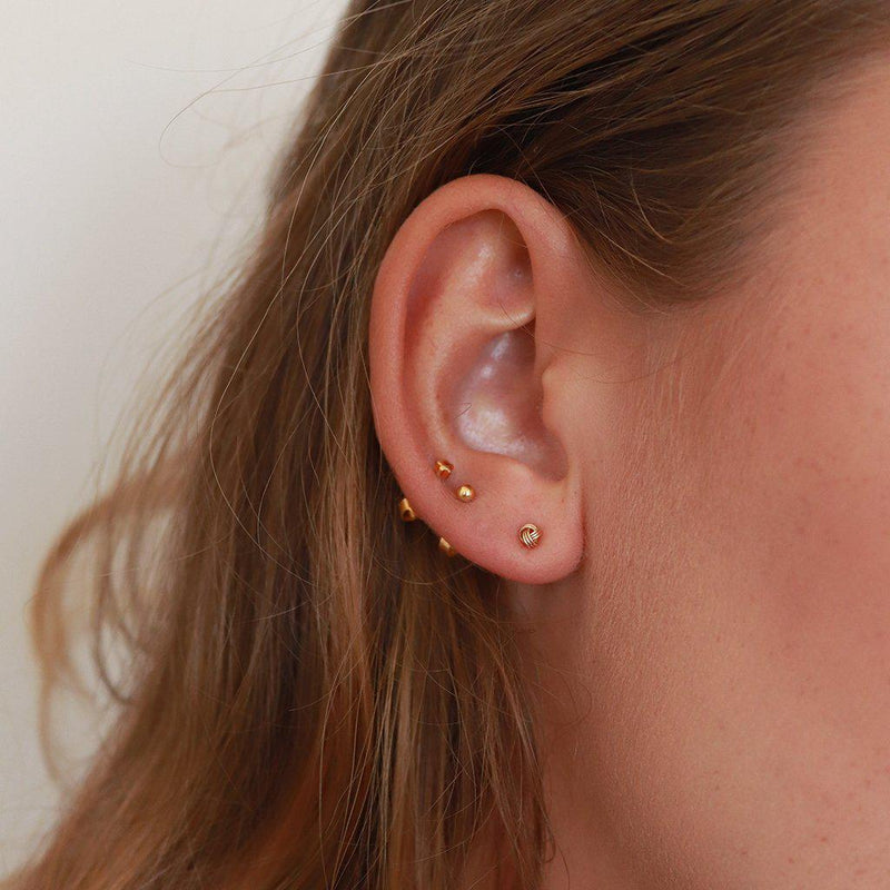 Daija 2 micron gold plated knot studs