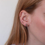Nia gold round brushed studs